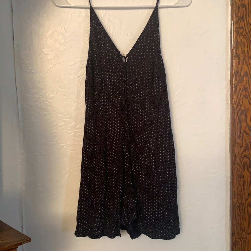 Black polka dot romper